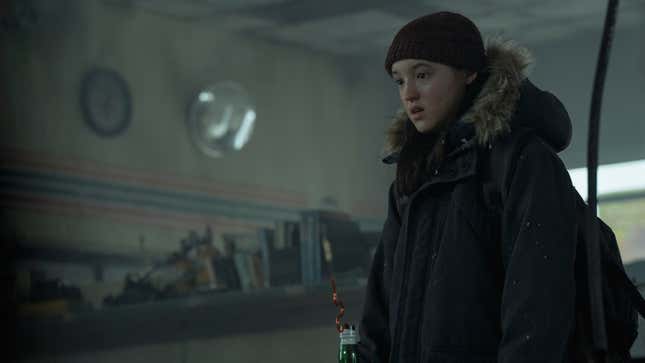 Ellie looks at something off-screen with a concerned expression.