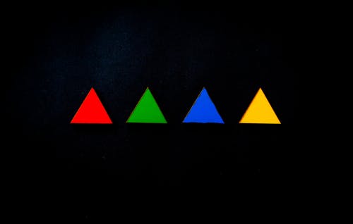 Colorful triangles on a black background