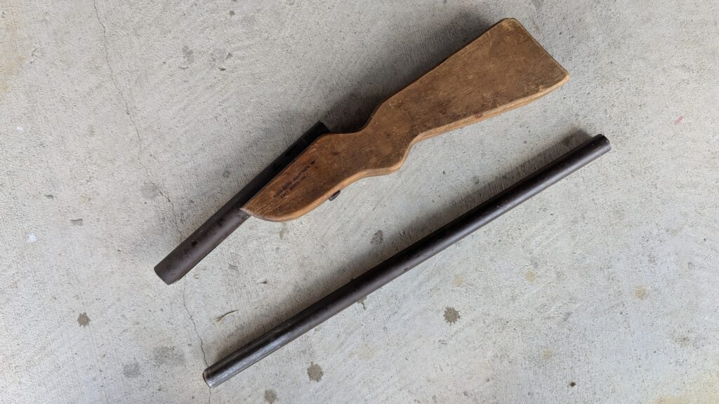 Richardson M5 Guerilla Gun slam-fire shotgun on wooden stock