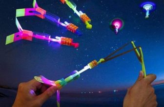 Flying Rotating Rocket Helicopter Catapult Slingshot LED Flash Light Toy Party
