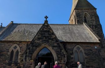 Church rededicated to God after apparent atheist hate crime attack