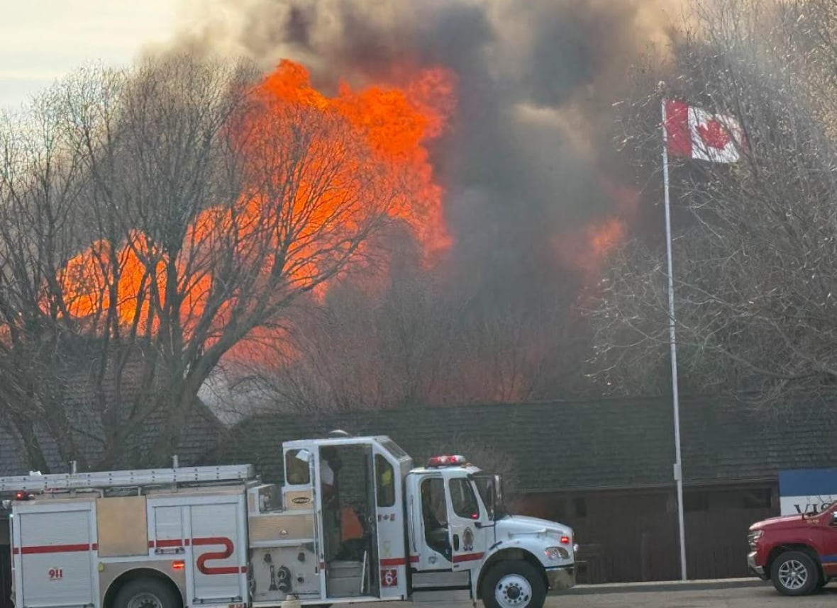 fire and smoke, canadian flag and firetrcuks