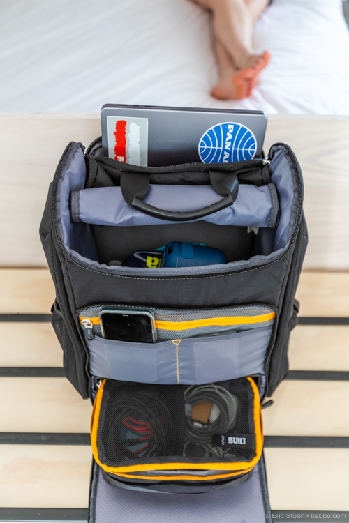 My electronics setup - a laptop, phone, and a lot of chargers, cables, converters and power banks! 