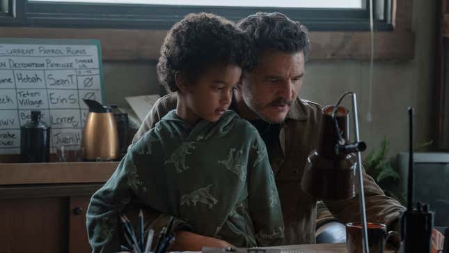 Joel sits with his nephew Benji on his lap.