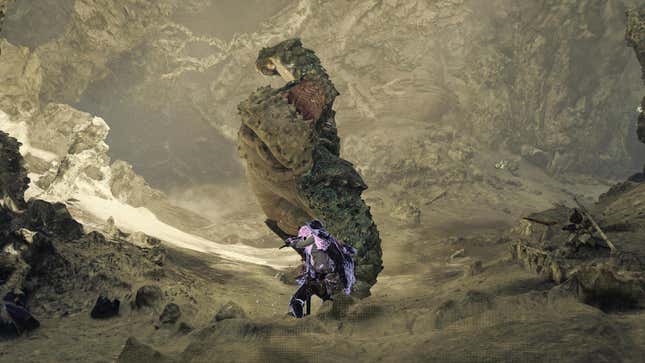 A Chatacabra prepares to slam the Corrupted Mantle-wearing hunter in front of it.