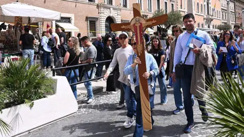 Getty Images Pilgrims gather for the death of Pope Francis at St. Peter's Basilica in Vatican City, State of Vatican, on April 21, 2025.