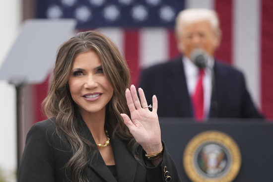 Homeland Security Secretary Kristi Noem is recognized as President Donald Trump speaks during an event to announce new tariffs in the Rose Garden at the White House, Wednesday, April 2, 2025, in Washington. (AP Photo/Mark Schiefelbein)
