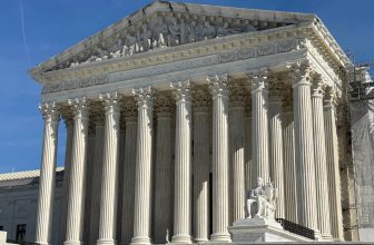 Justices temporarily bar government from removing Venezuelan men under Alien Enemies Act