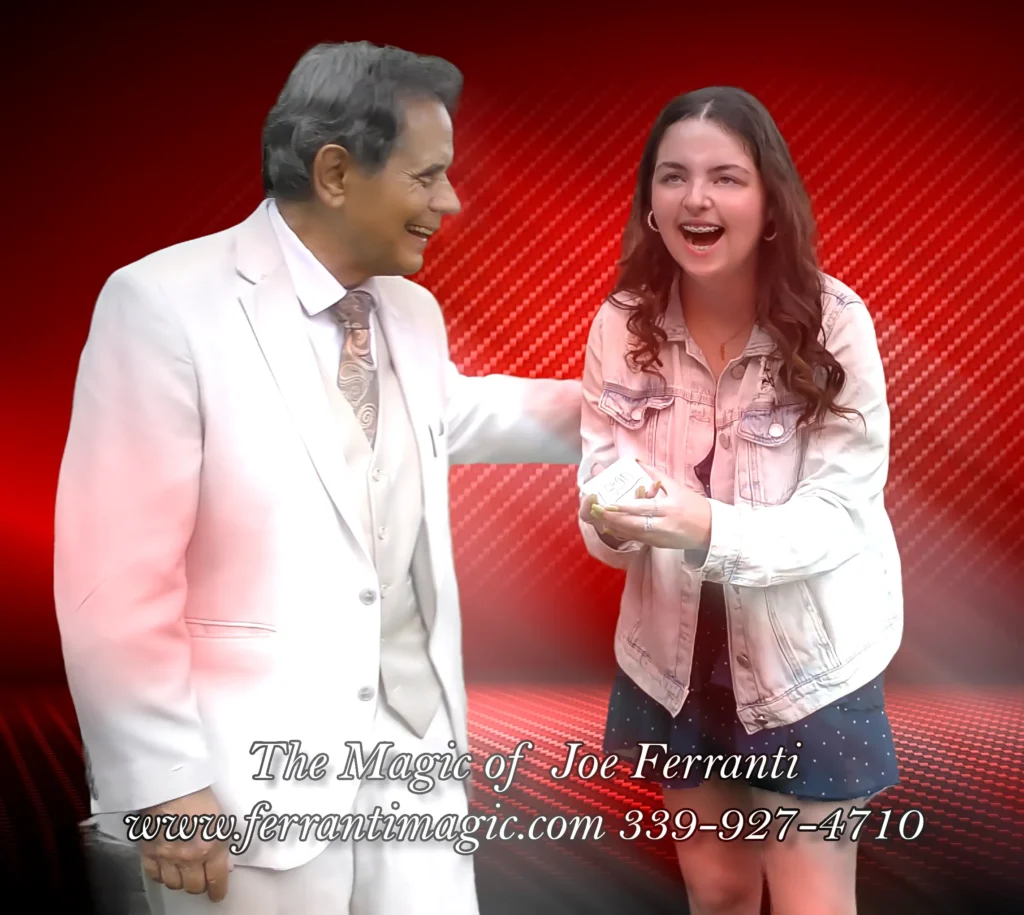 The Magic of Joe Ferranti 1 The Best in Magic Entertainment Magician or Illusionist Joe Ferranti performs a little mind reading for an excited young woman