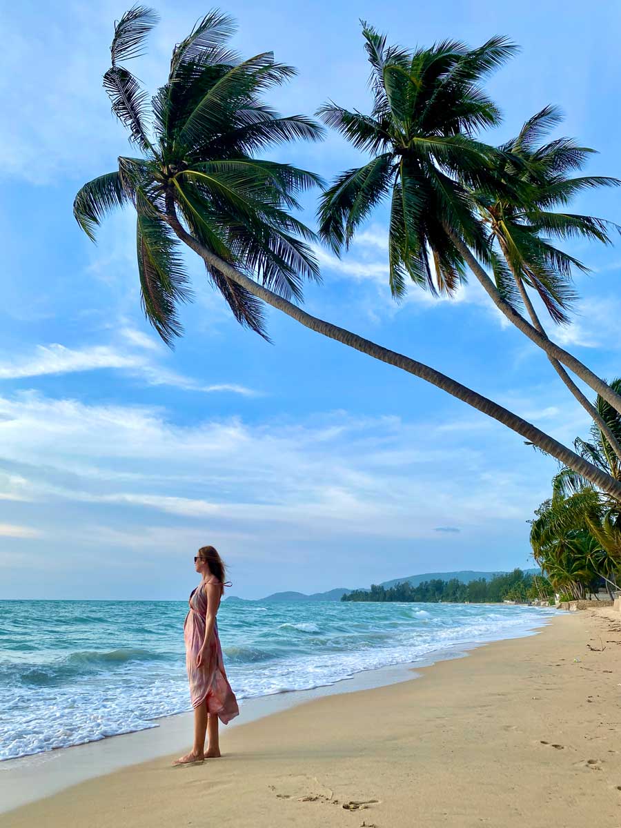 anna in silk dress exploring luxury resorts in koh samui