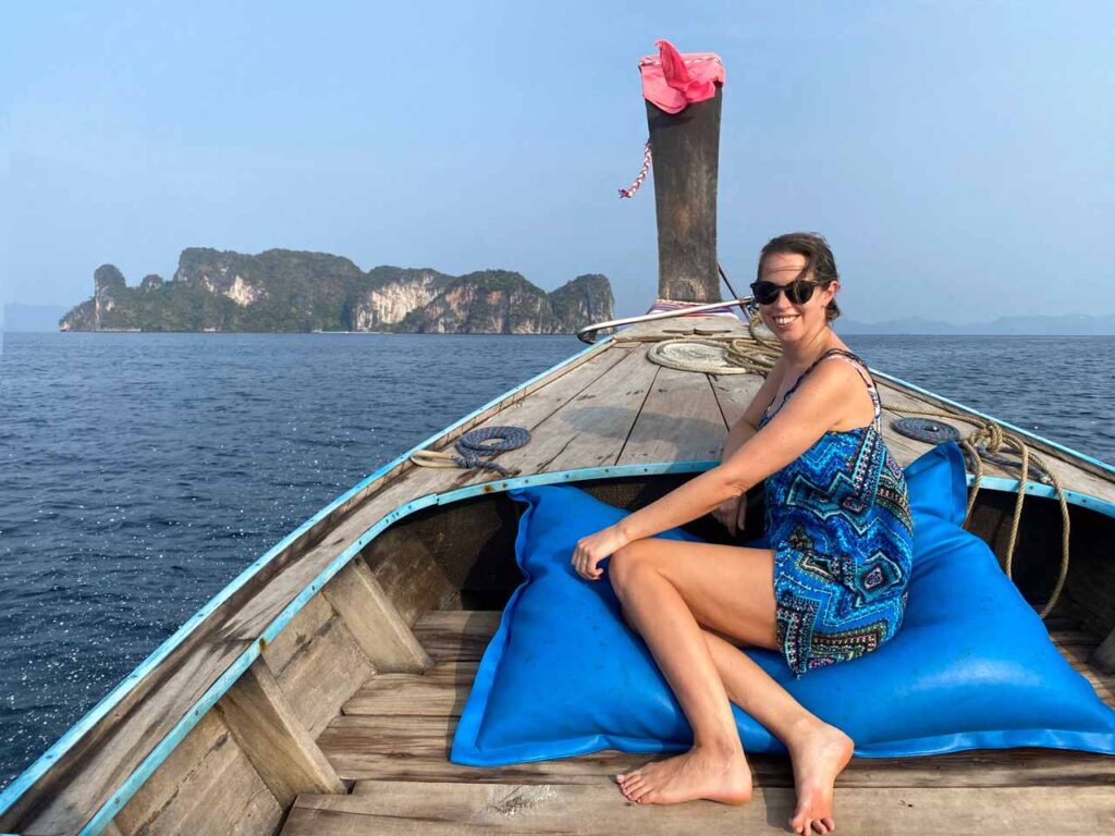 anna on a longtail boat to the hong islands in krabi thailand