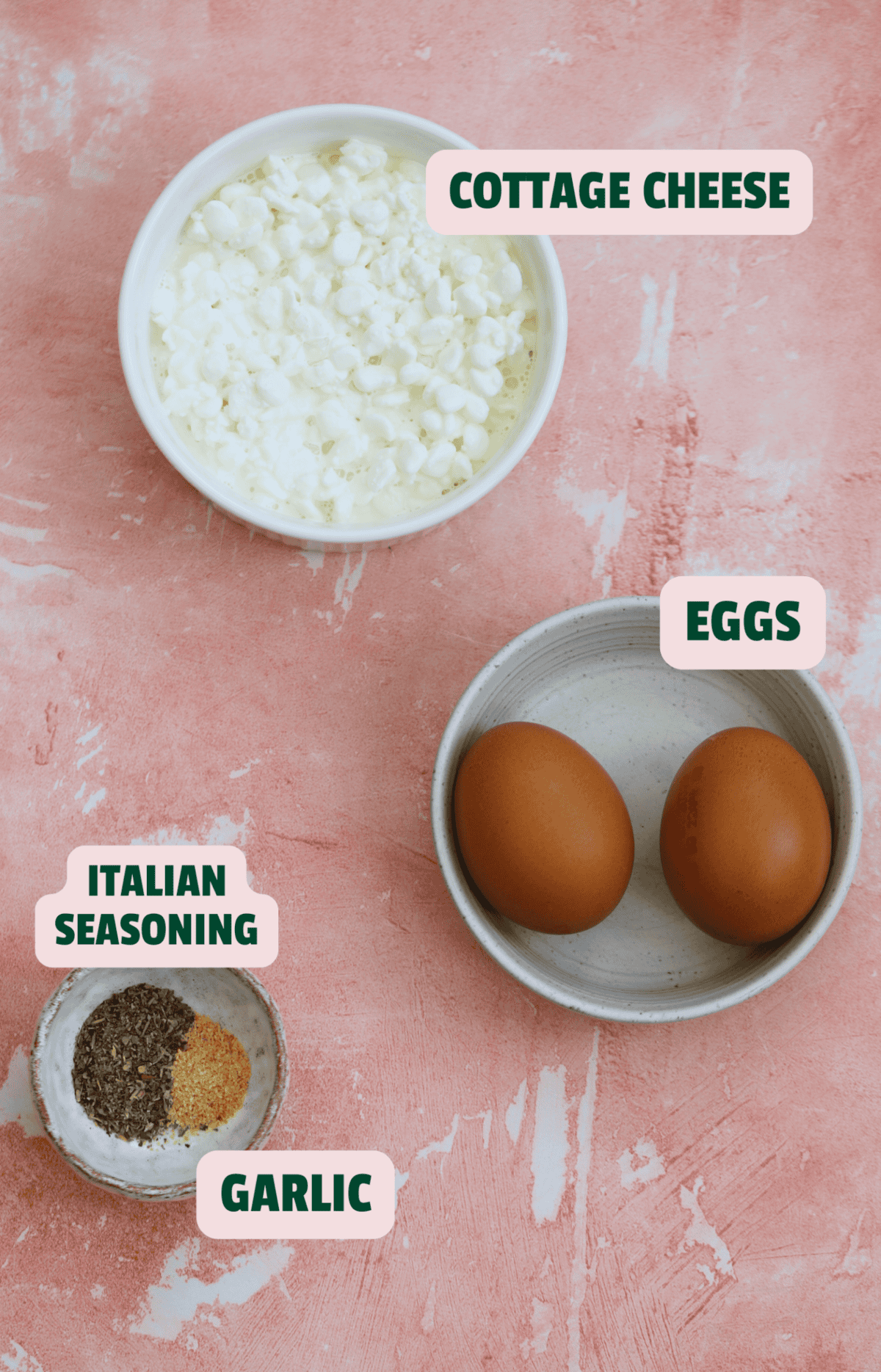 Ingredients for cottage cheese flatbread on a pink backdrop.