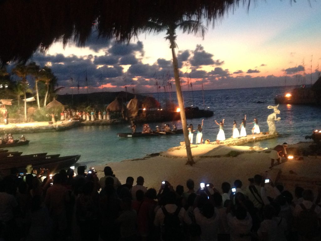 Canoes offshore leave for Cozumel.