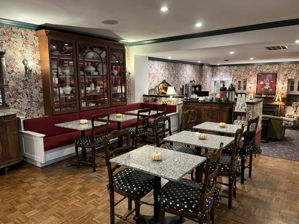 Charming British Hotel in San Francisco: My Stay at White Swan Inn 7 Bright breakfast lounge at White Swan Inn with round tables, vintage chairs, and soft natural lighting.