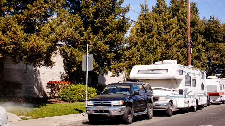California street lined with people who live in their cars or RVs