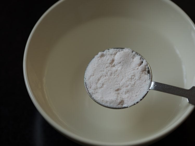 adding salt to water. 