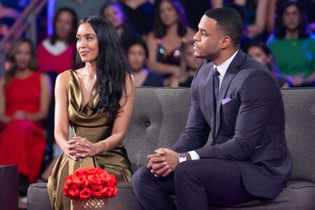 Litita sits next to grant on a couch