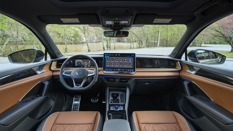 interior of the tiguan turbo parked in front of a swamp