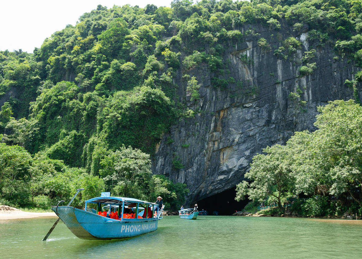Blue boat outside Phong Nha cave