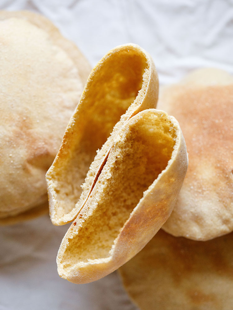 side and close up view of pita bread pockets. 