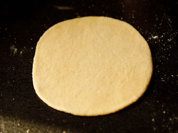 dough rolled to a 5 to 6 inches disc for pita bread recipe. 