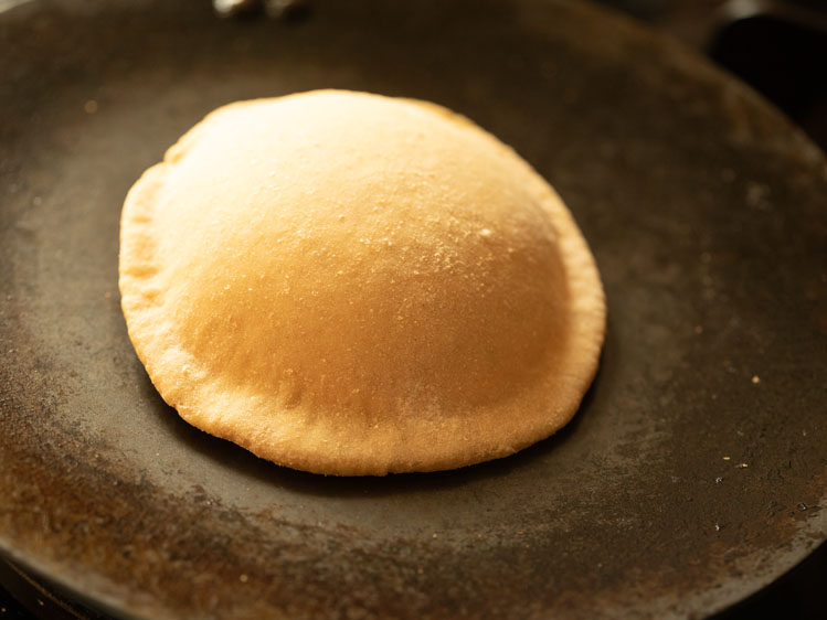 dough disc all puffed up. 