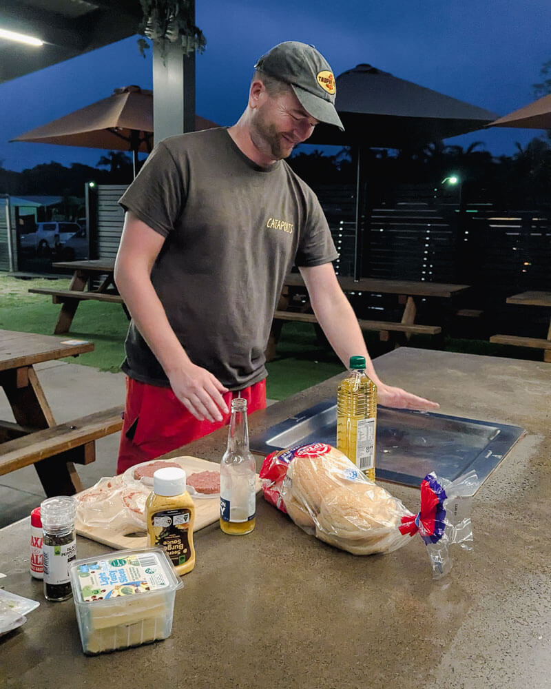 Man cooking on an outdoor grill