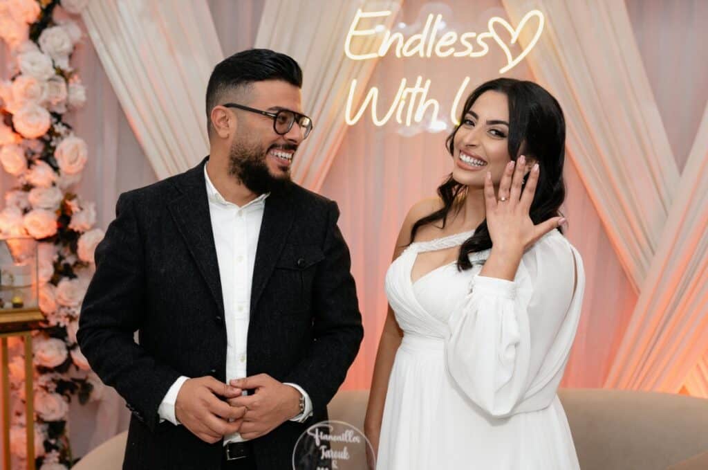 woman with fiance showing off engagement ring