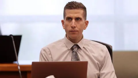 Getty Images Bryan Kohberger sits at a change of plea hearing