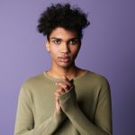 Close-up,Portrait,Of,Transgender,African,American,Man,With,Afro,Hairstyle.