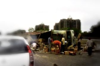 IMFL bottles damaged as lorry overturns   09545   # Explore / Interestingness / November 2009 / 5th