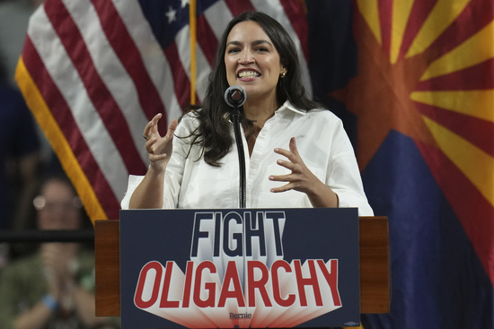 Rep. Alexandria Ocasio-Cortez, D-N.Y., speaks during a "Fighting Oligarchy" tour event at Arizona State University, Thursday, March 20, 2025, in Tempe, Ariz. (AP Photo/Ross D. Franklin)