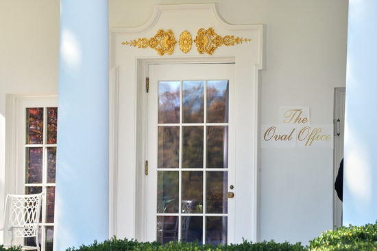A sign is seen outside the Oval Office before President Donald Trump walks out to board Marine One on the South Lawn of the White House, Wednesday, Nov. 5, 2025, in Washington. (AP Photo/Evan Vucci)