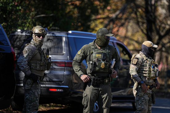 U.S. Border Patrol agents look on, Monday, Nov. 17, 2025, in Charlotte, N.C. (AP Photo/Matt Kelley) U.S. Border Patrol agents look on, Monday, Nov. 17, 2025, in Charlotte, N.C. (AP Photo/Matt Kelley)