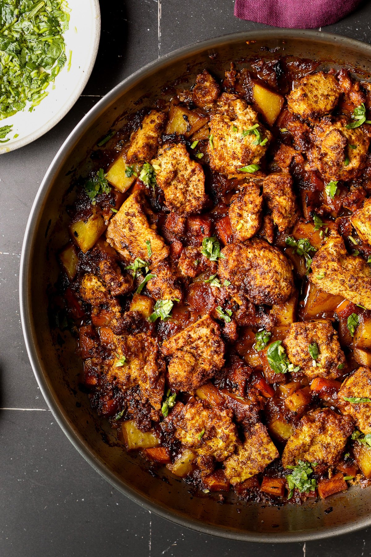 close-up of braised tofu and veggies in the pan