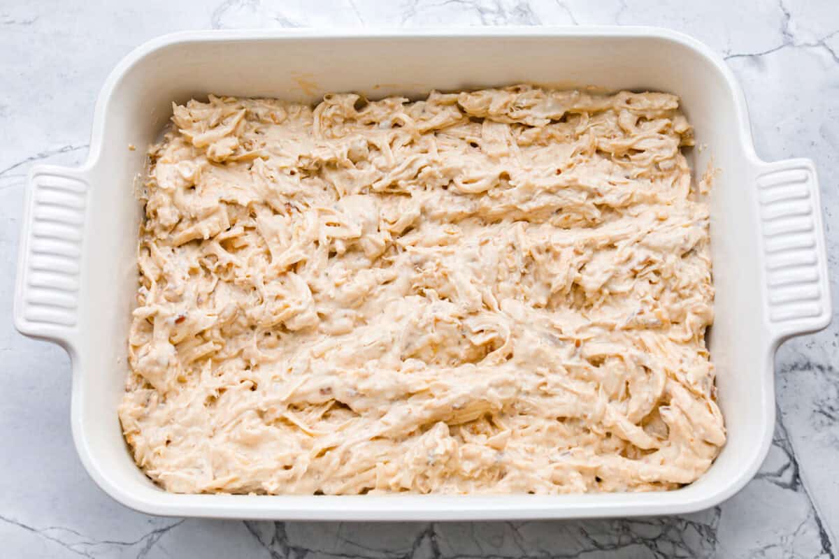 Creamy, cheesy, and packed with shredded chicken, this French onion chicken casserole is comfort food at its best! Inspired by French onion soup and dip, it’s topped with crispy fried onions for a crunchy finish. Ingredients all mixed together and added to a baking dish.