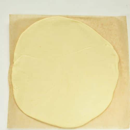 Almond Flour Fathead Dough rolled on a baking sheet.