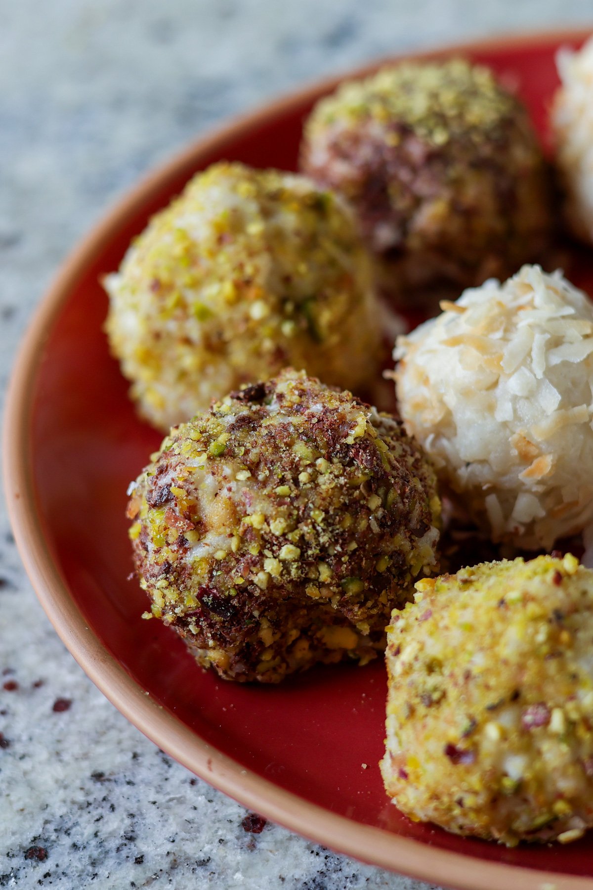 close-up of chocolate pistachio kheer ladoo on a plate