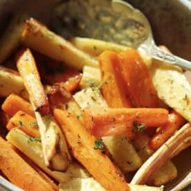 A bowl of air fryer carrots and parsnips.