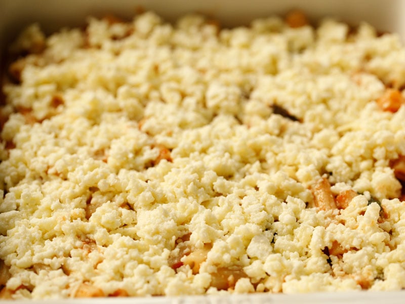 cheese mixture spread over ziti prior to baking