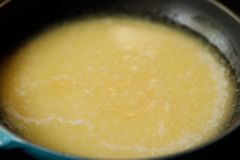 Melted butter in skillet.
