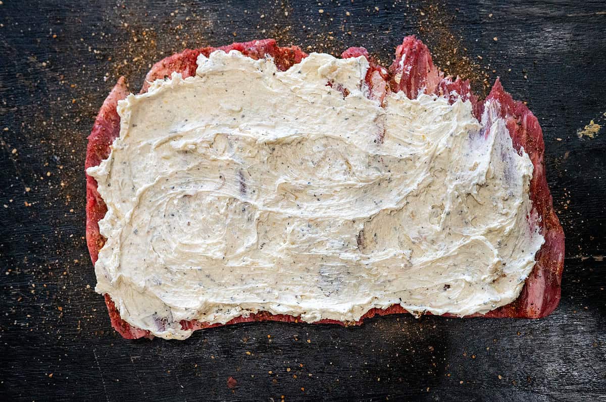 shallot cream cheese spread on flank steak.
