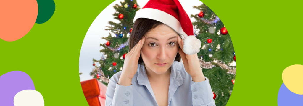 Banner for how to handle holiday stress without alcohol featuring a worried woman in a Santa hat holding her head in front of a decorated Christmas tree.