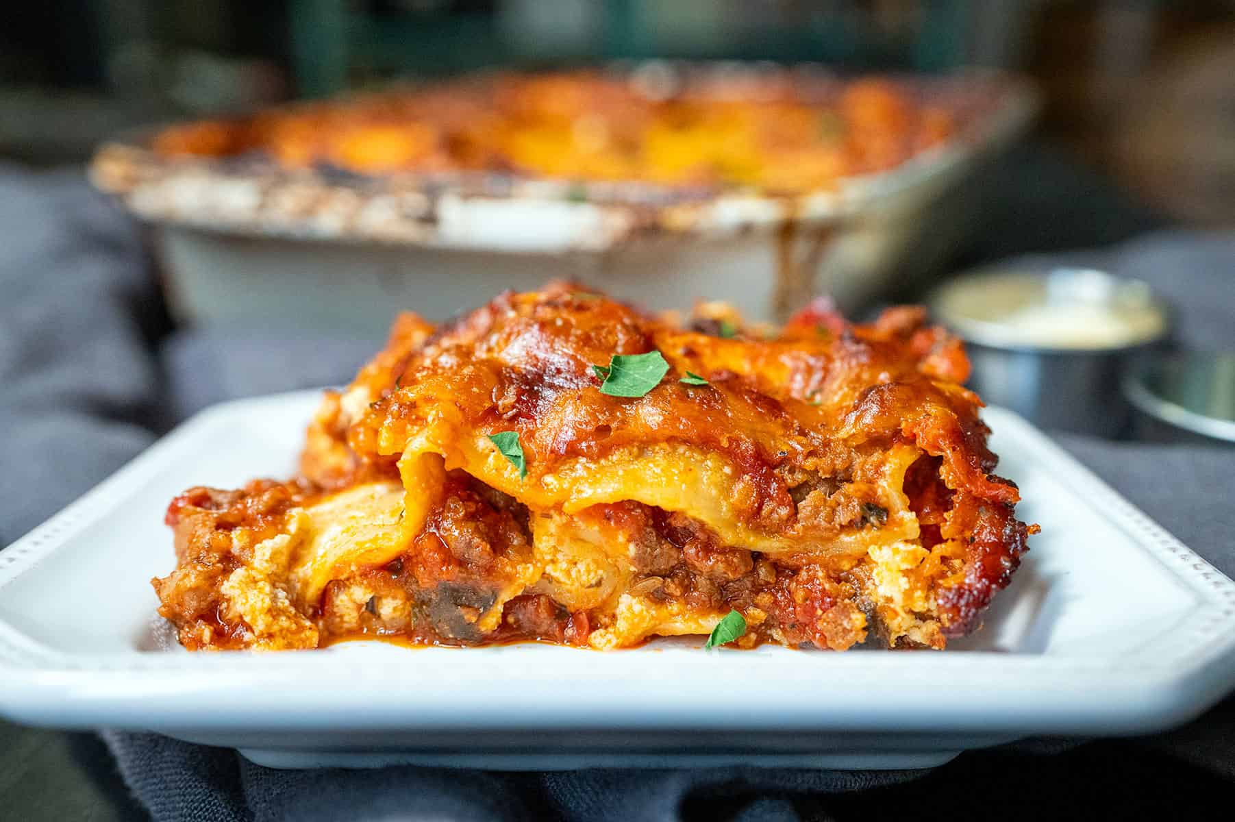 Slice of Easy Lasagna Recipe with ricotta and mozzarella. 