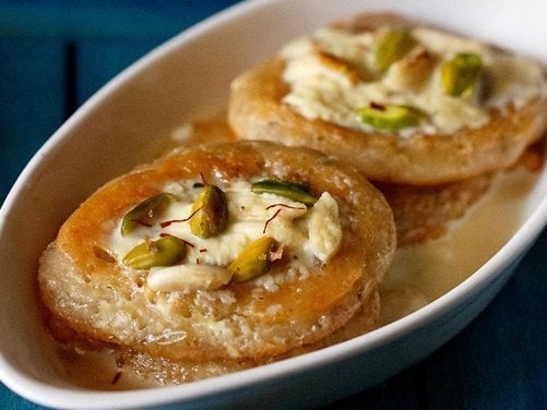 malpua rabdi in a white tray.