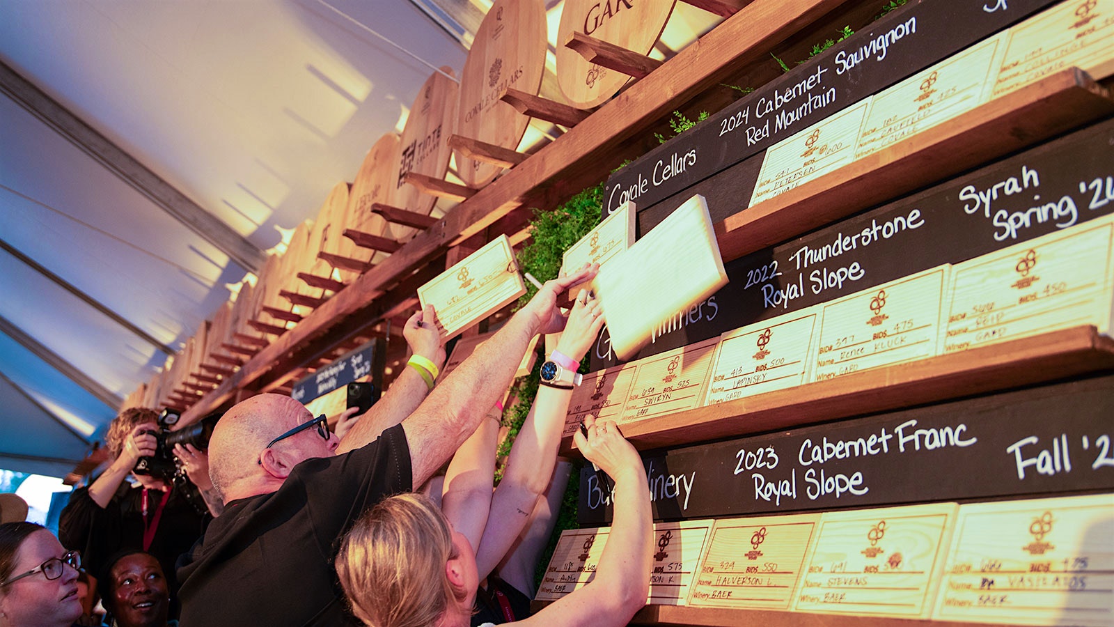  Bids are placed for Washington wine barrels at the 2025 Winemaker Picnic and Barrel Auction.