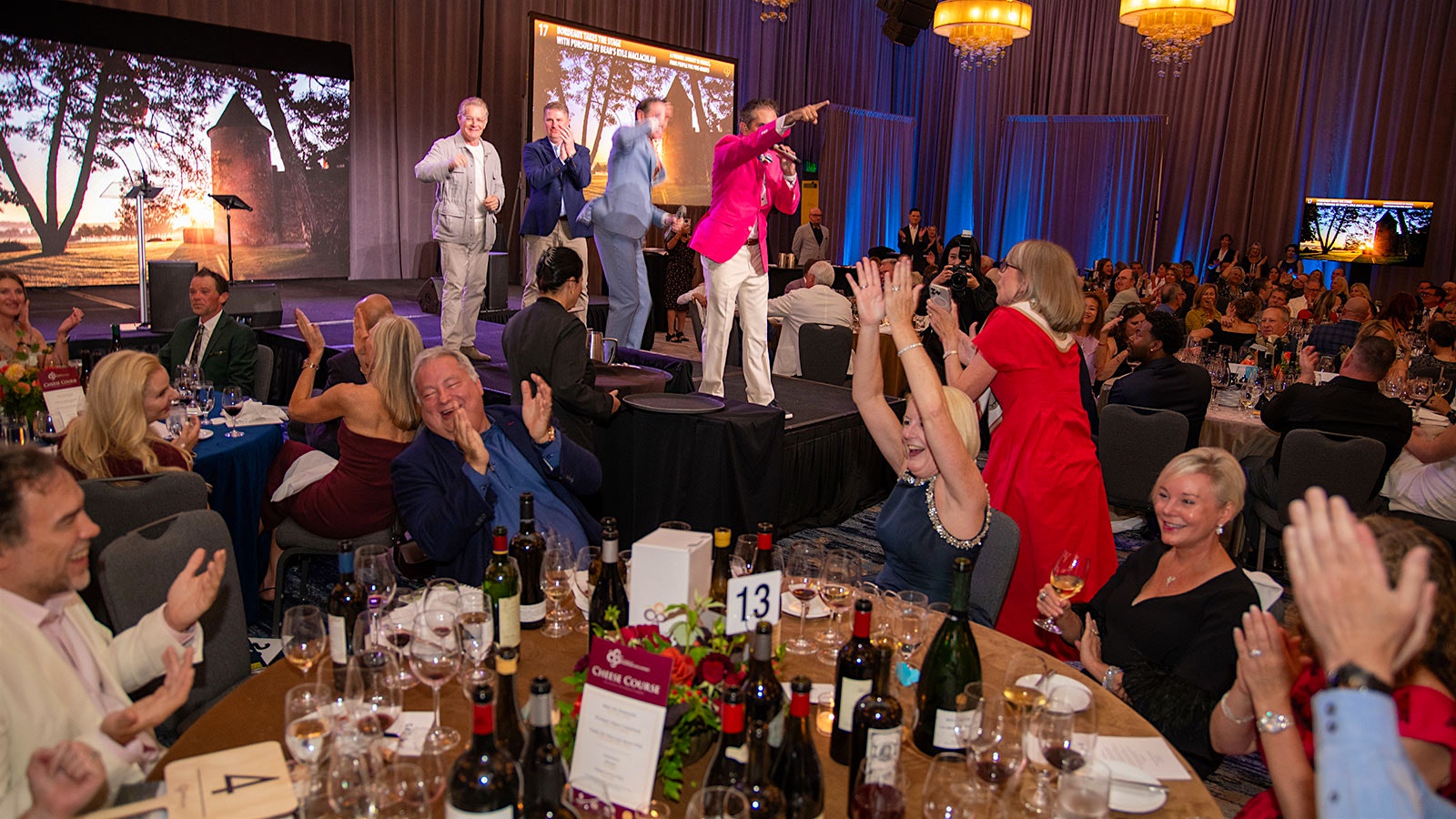  Actor Kyle MacLachlan and auctioneers Fred Northup Jr. and Matt Lorch at the 2025 Auction of Washington Wines.