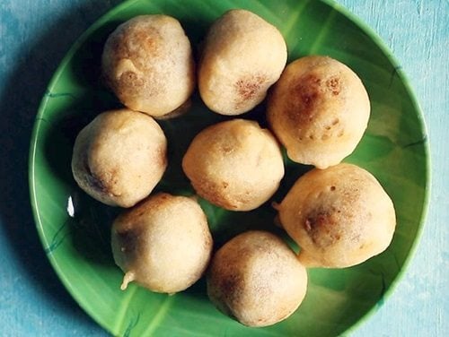poornam boorelu on a green plate.