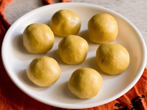 maa ladoo on a white plate.