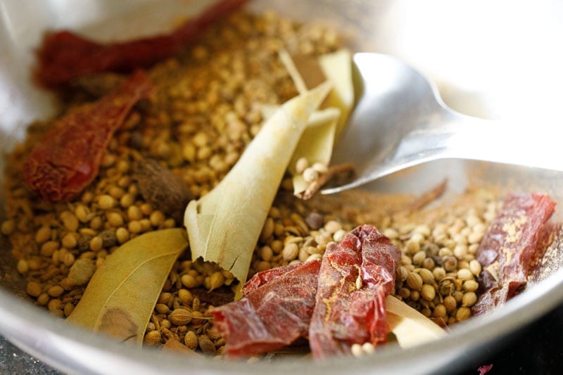 Ground spices mixed with the whole spices.